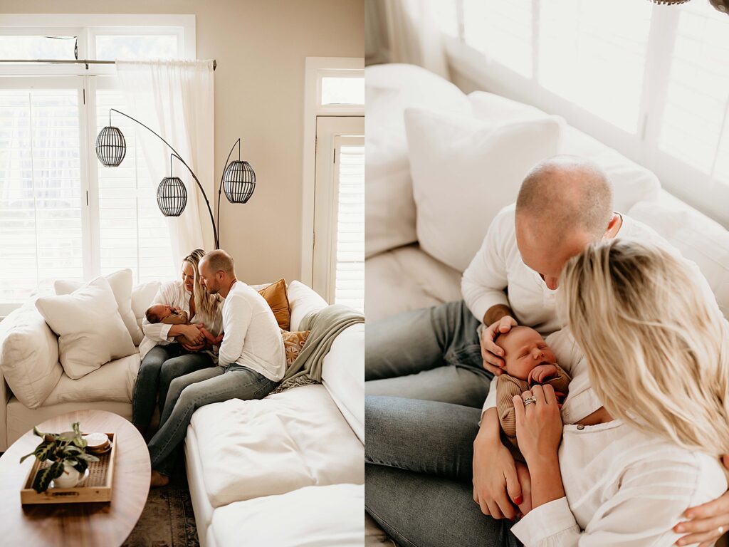 Mom and dad holding their newborn on their couch for family newborn photos.

